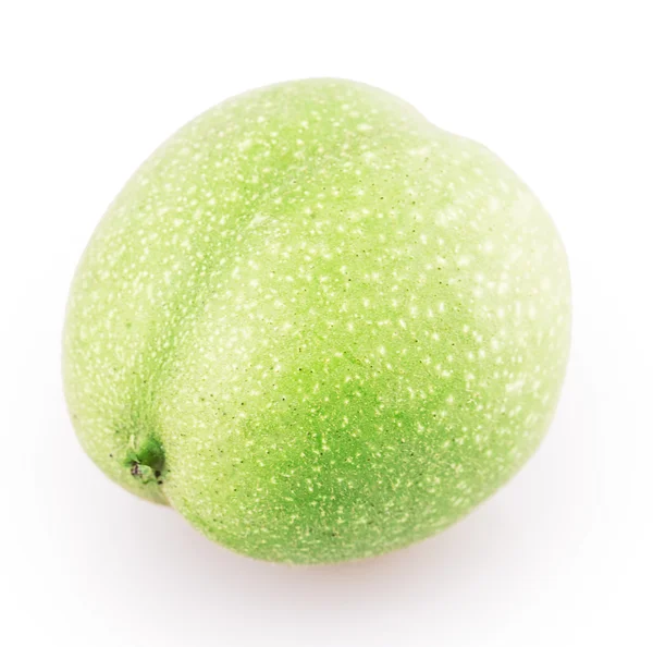 Green walnut in closeup — Stock Photo, Image