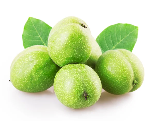 Three green walnuts — Stock Photo, Image