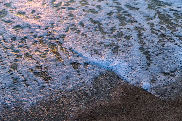 Deniz köpüğü beach taşlar — Stok fotoğraf
