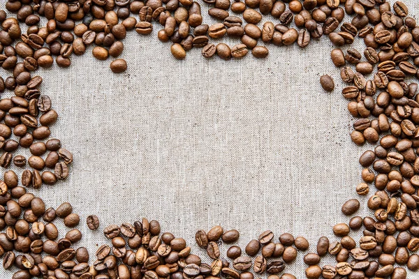 Koffiebonen op doek — Stockfoto