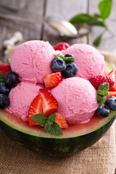Refreshing berry sorbet served in watermelon