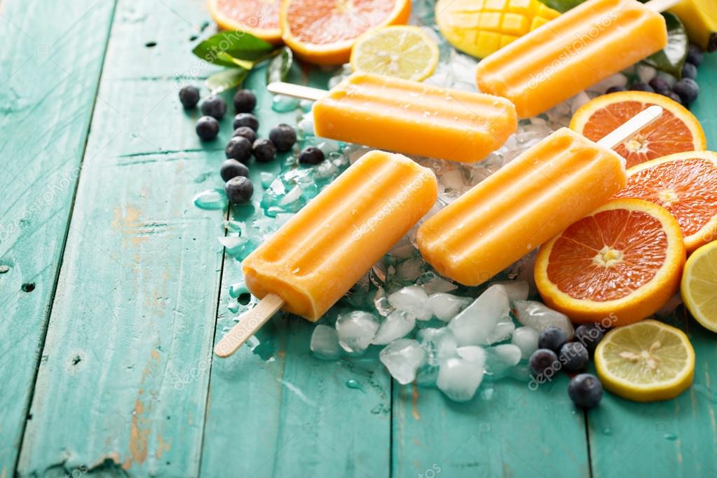 Mango banana popsicles on ice Stock Photo by ©fahrwasser 103896064
