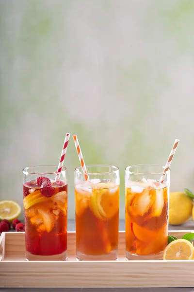 Iced tea variety in tall glasses — Stock Photo, Image