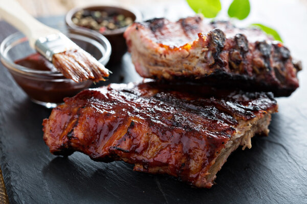 Grilled pork baby ribs with bbq sauce