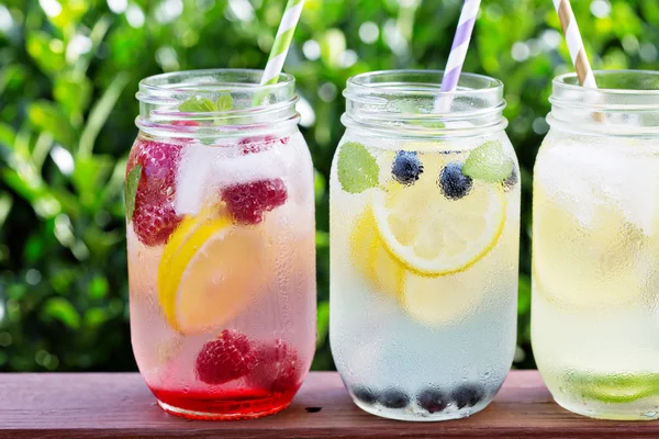 Variety of lemonade in jars — Stock Photo, Image