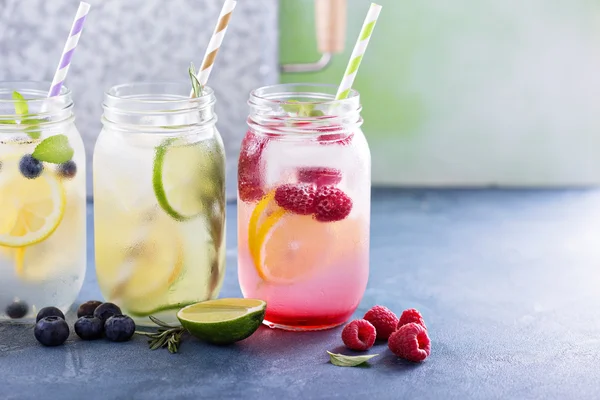 Variety of lemonade in jars — Stock Photo, Image