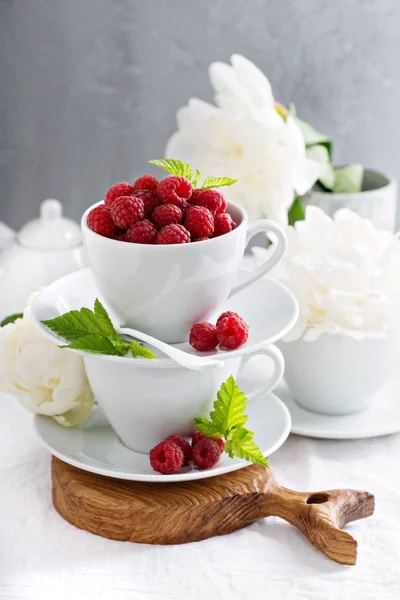 Fresh raspberries in stacked cups Stock Picture