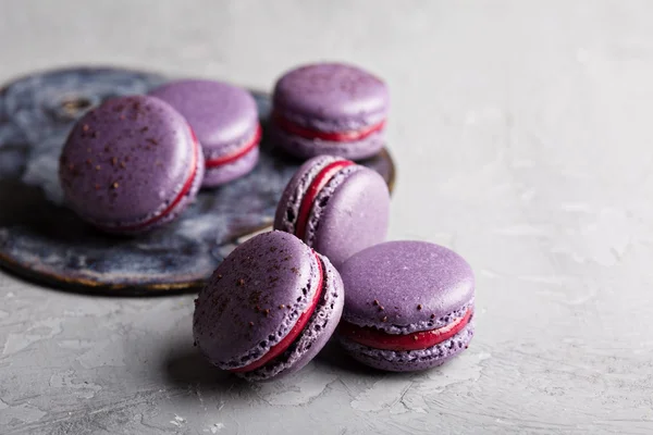 French macarons on a gray table — Stock Photo, Image