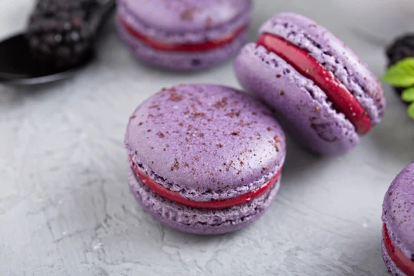 French macarons on a gray table