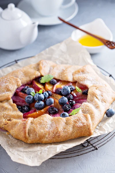 Rustic gallette pie with peaches and blueberry — Stock Photo, Image