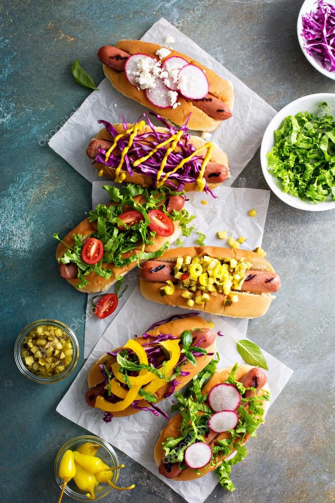 Variety of hot dogs with healthy garnishes Stock Photo by ©fahrwasser ...