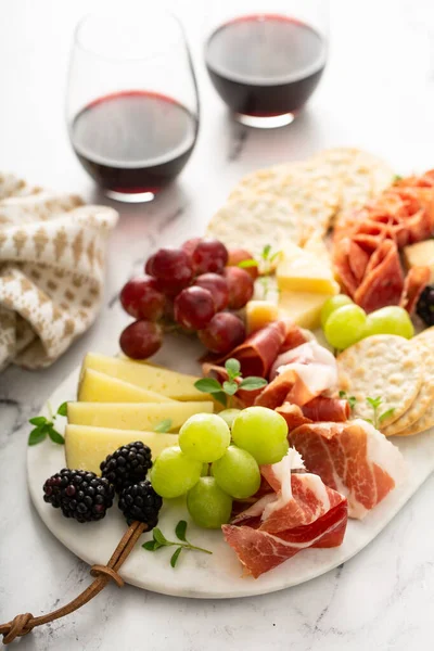 Charcuterie board with cheese and meat — Stock Photo, Image