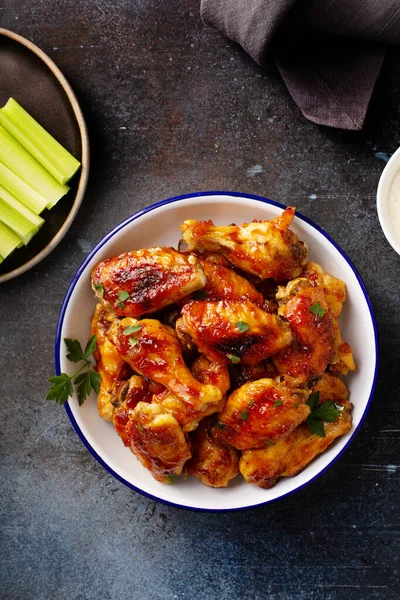 Sweet and spicy chicken wings with glaze