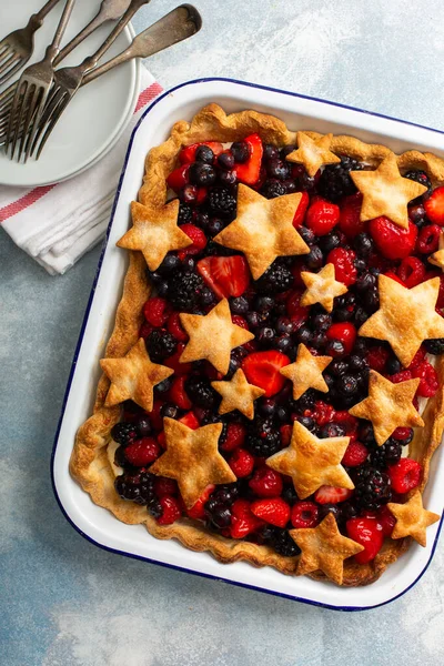 Berry pie decorated with stars for the 4th of July