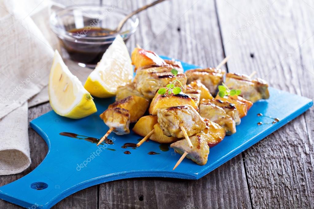 Grilled pork kabobs with peaches Stock Photo by ©fahrwasser 51858343