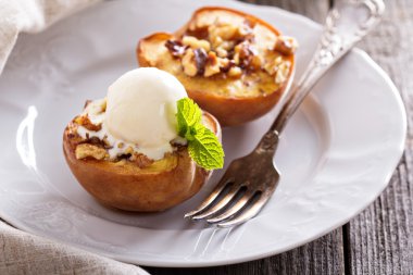 Baked peaches with ice cream clipart