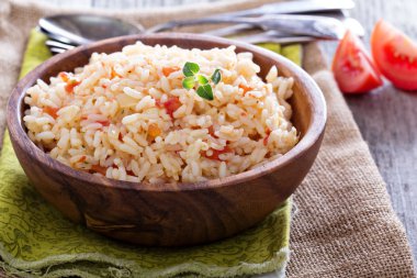 Rice with tomatoes and onions clipart