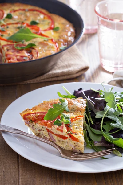 Frittata with vegetables and ham — Stock Photo, Image