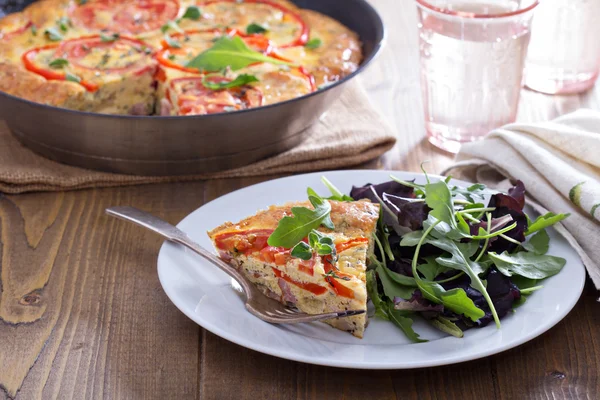 Frittata with vegetables and ham — Stock Photo, Image