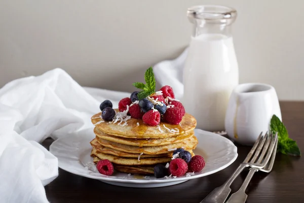 Coconut flour pancakes with fresh berries