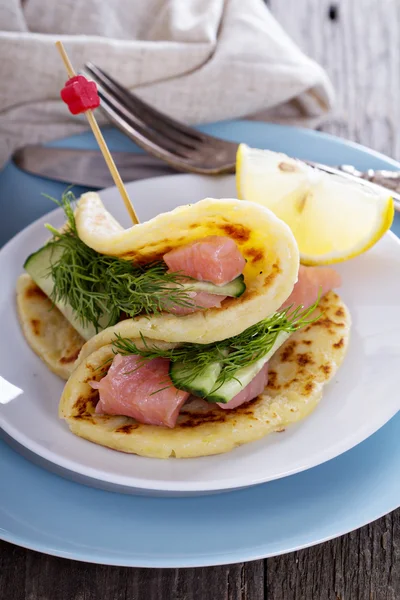 Scandinavian potato pancakes with salmon — Stock Photo, Image