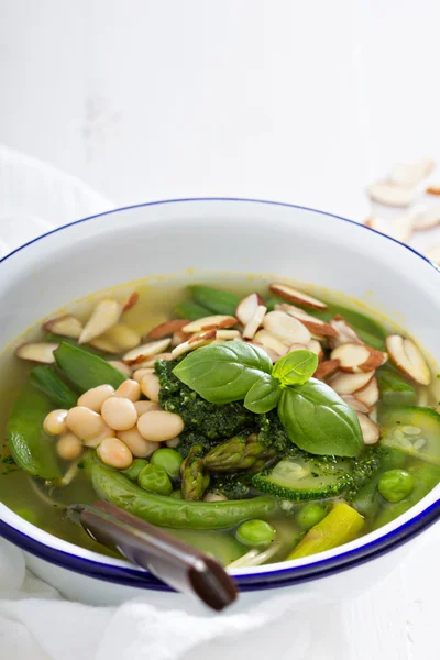 Minestrone soup with spring green vegetables — Stock Image Minestrone soup with spring green vegetables Stock Photo