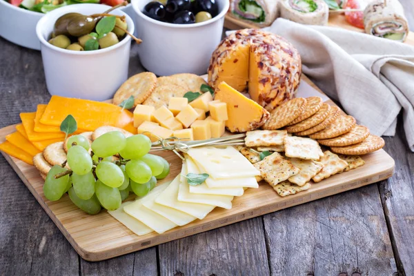 Cheese plate on a table — Stock Photo, Image