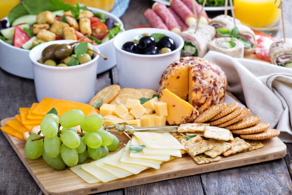 Cheese plate on a table — Stock Photo, Image