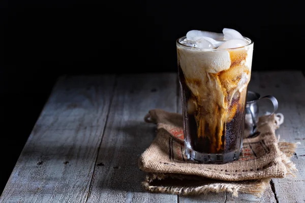 Iced coffee in a tall glass — Stock Photo, Image