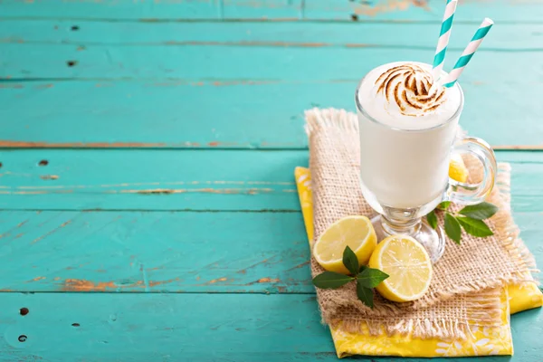 Lemon milkshake with meringue on top — Stock Photo, Image