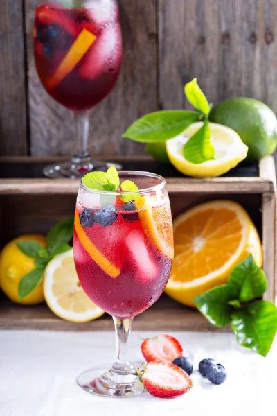 Ice cold red sangria with citrus fruits — Stock Photo, Image