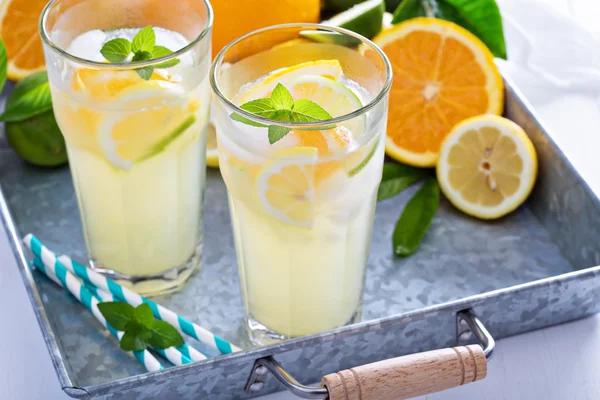 Homemade citrus lemonade in tall glasses — Stock Photo, Image