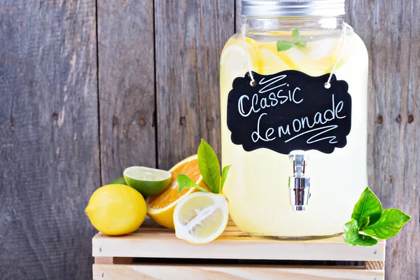 Homemade lemonade in beverage dispencer — Stock Photo, Image