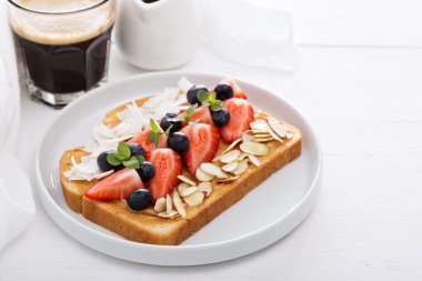 Toast with almond butter and toppings