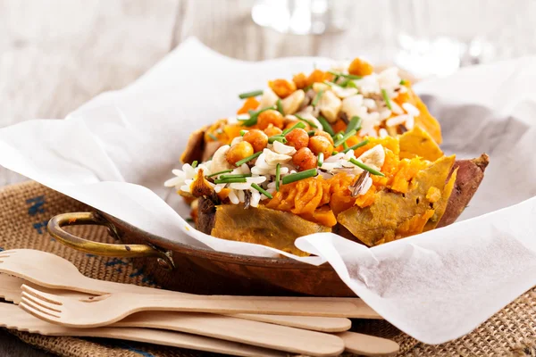Baked stuffed sweet potato with rice — Stock Image Baked stuffed sweet potato with rice Royalty Free Stock Images