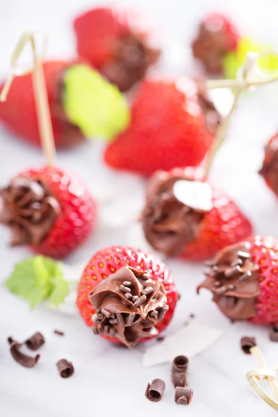 Fresh strawberries filled with chocolate mousse — Stock Photo, Image