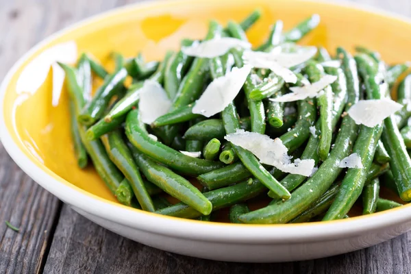 Sauteed green beans on big plate — Stock Photo, Image