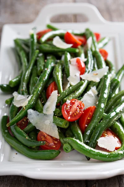Warm salad with green beans and parmesan cheese — Stock Photo, Image