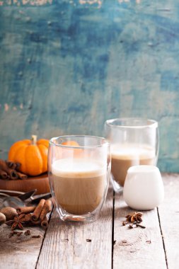 Pumpkin spice latte with spices clipart