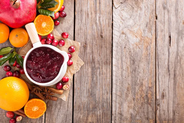 Cranberry sauce in ceramic saucepan — Stock Photo, Image