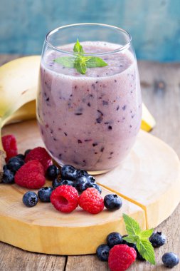 Banana and mixed berry smoothie clipart