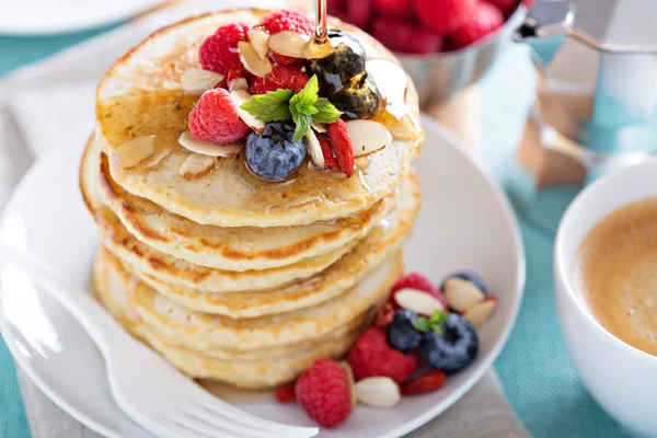 Fluffy oatmeal pancakes stack with fresh berries — Stock Photo, Image