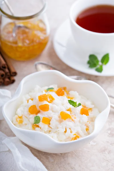 Rice pudding with dried apricots — Stock Photo, Image