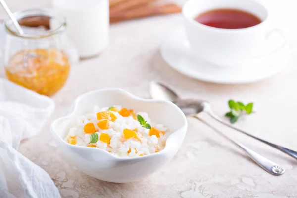 Rice pudding with dried apricots — Stock Photo, Image