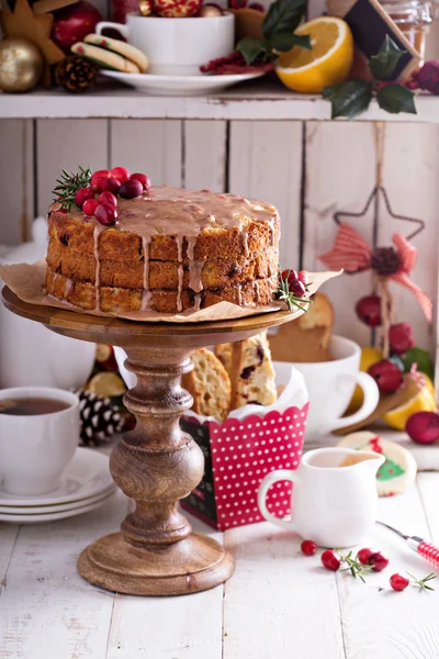 Oranje en cranberry christmas cake met glaze — Stockfoto