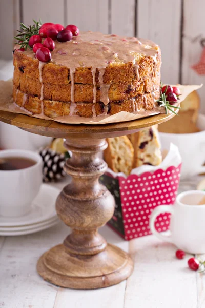 Oranje en cranberry christmas cake met glaze — Stockfoto