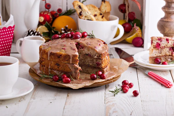 Turuncu ve kızılcık Noel kek sır ile — Stok fotoğraf