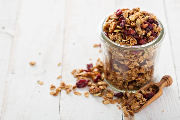 Homemade granola in a glass jar — Stock Photo, Image