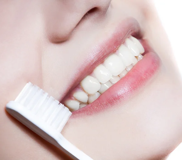 Beautiful woman with toothbrush. Dental care — Stock Photo, Image