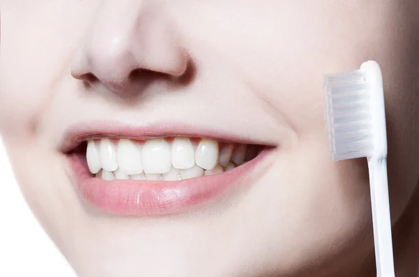 Beautiful woman with toothbrush. Dental care — Stock Photo, Image